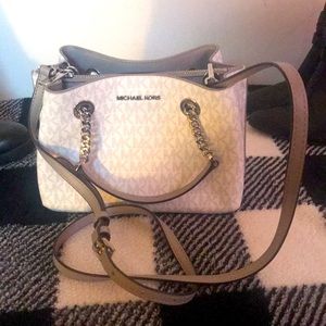 This unique bag is a small wonder with lots of room to carry all necessities.